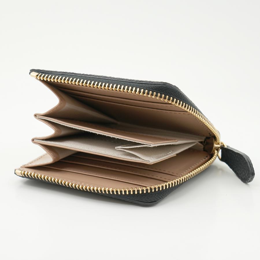 黒色のドイツシュリンクL字ファスナーミニ財布の使用例
