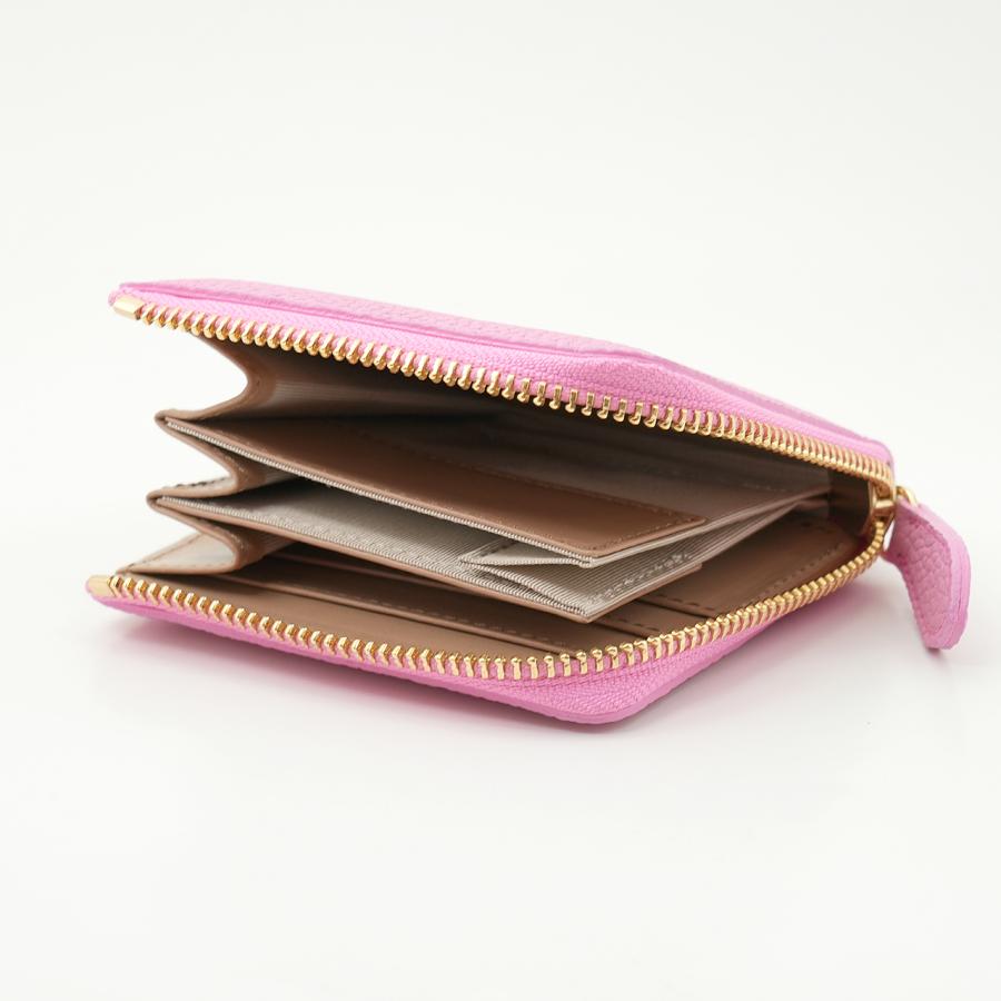 ピンク色のドイツシュリンクL字ファスナーミニ財布の使用例