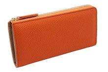 ドイツシュリンクを使用したオレンジ色のＬ字ファスナー長財布